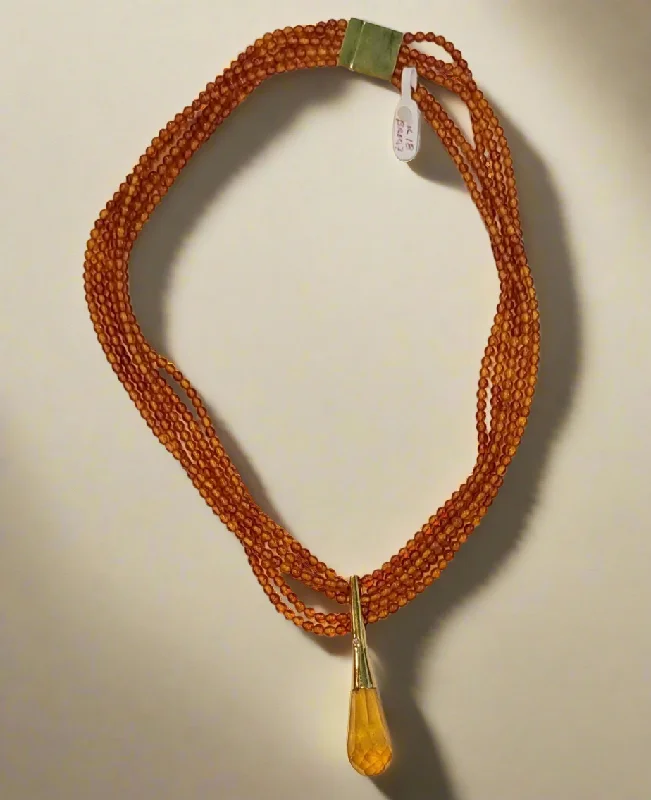 Two-tone necklaces-Necklace with Amber and medallion with brilliant in gold 18k